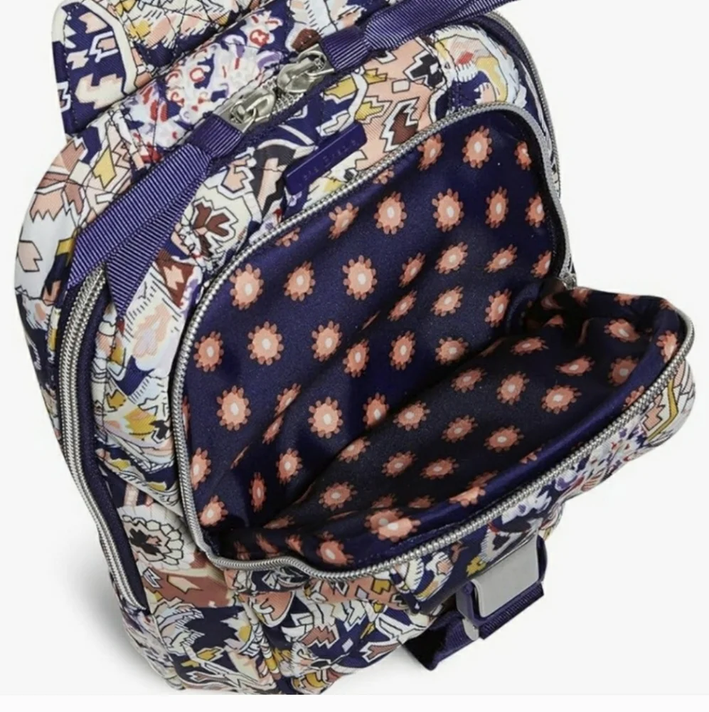 Vera Bradley Women's‎ Performance Twill Utility sling backpack.